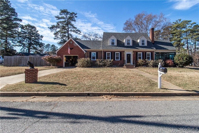 cape cod home featuring a front lawn and a garage