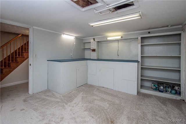 basement featuring ornamental molding and light carpet