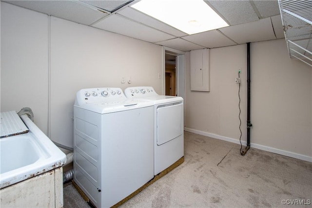 clothes washing area featuring washer and dryer and light colored carpet