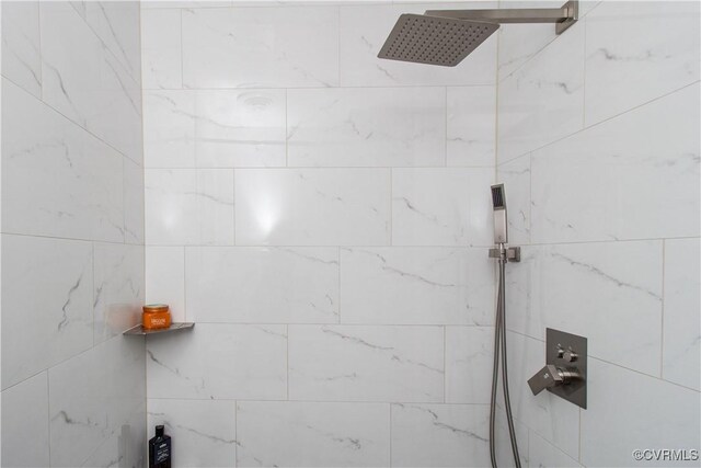 details with a tile shower