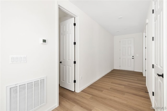 hall featuring light hardwood / wood-style flooring