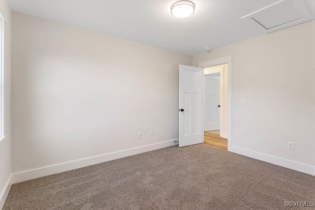 unfurnished room with carpet floors