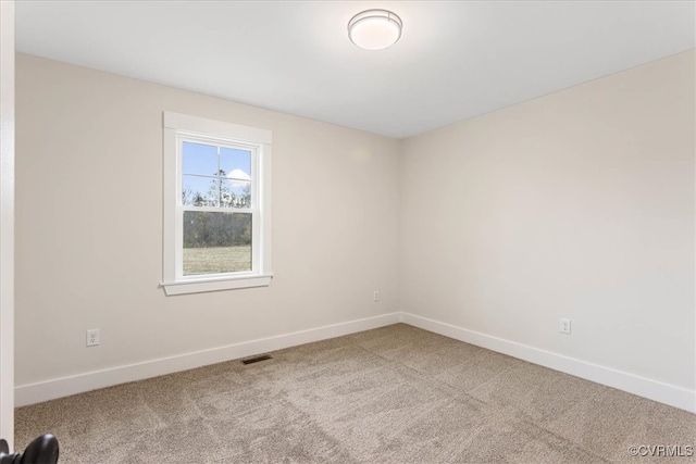 unfurnished room featuring carpet floors