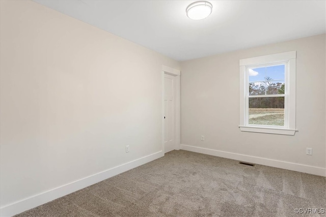 view of carpeted spare room