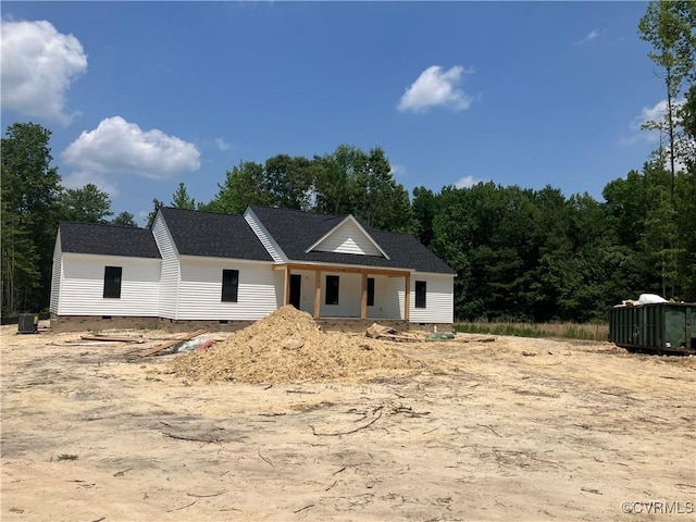 14310 Meadow Ln, Disputanta, VA 23842 - view of front of home featuring crawl space, central air condition unit, and roof with shingles