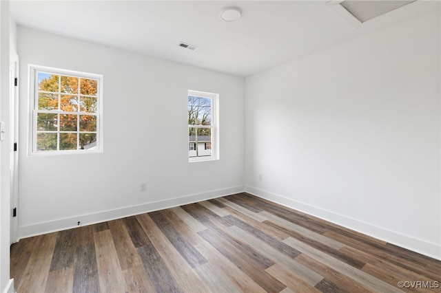 empty room featuring hardwood / wood-style floors