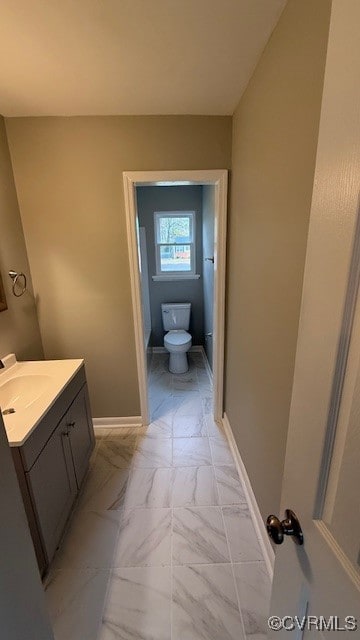 bathroom with vanity and toilet