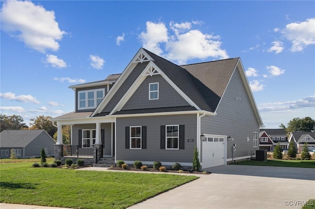 TBD2 Rocky Ford Rd, Beaverdam, VA 23015 - craftsman-style home with a front yard, driveway, an attached garage, covered porch, and central air condition unit