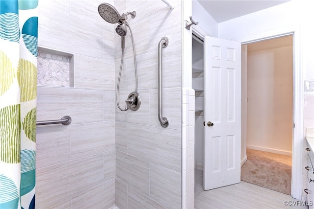 bathroom featuring curtained shower