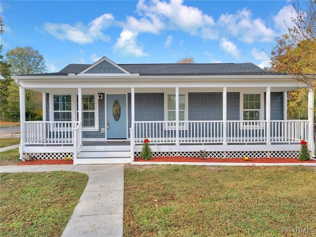 view of front facade with covered porch and a front lawn