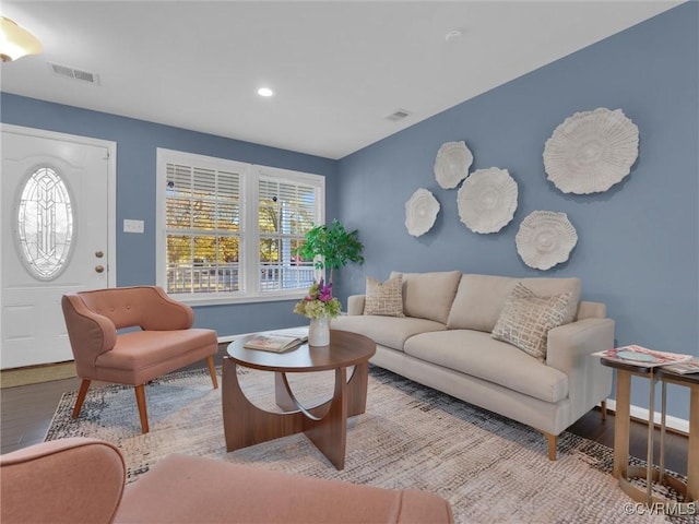 living room with light hardwood / wood-style floors