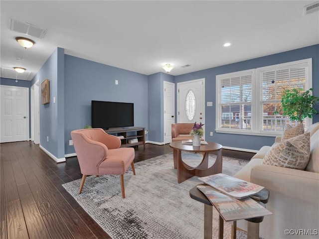 living room with dark hardwood / wood-style floors