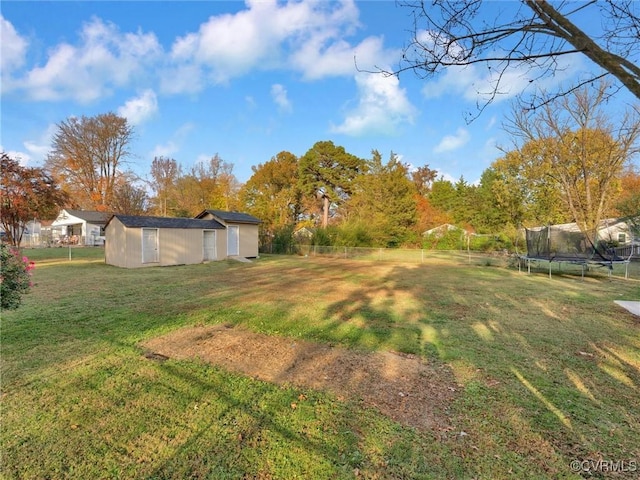 view of yard with a trampoline