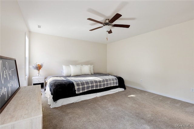 bedroom featuring ceiling fan and carpet floors