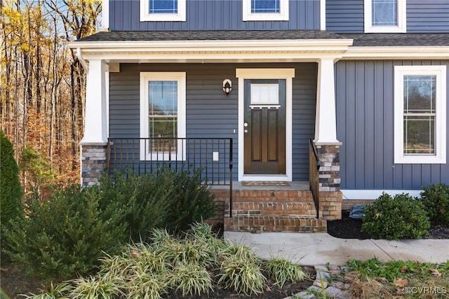 doorway to property featuring a porch