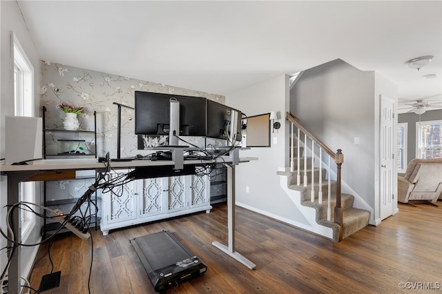 interior space with ceiling fan and hardwood / wood-style floors