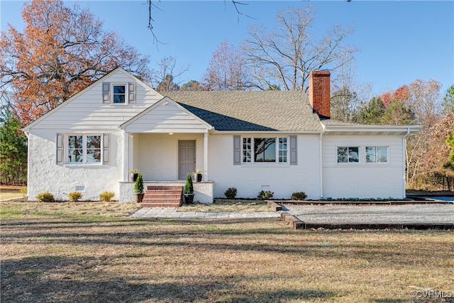 view of front of home with a front yard