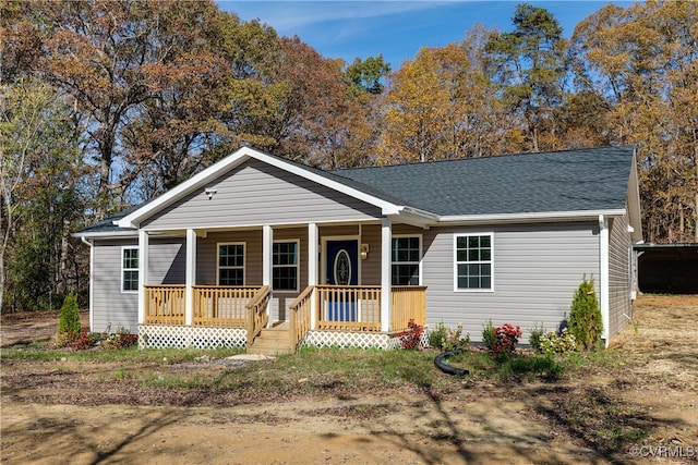 single story home featuring covered porch