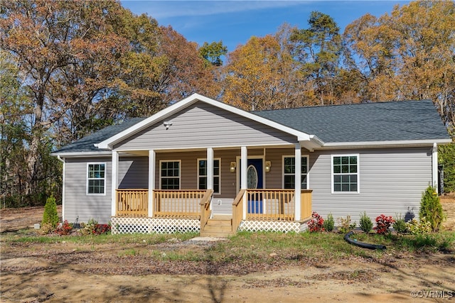 single story home featuring a porch