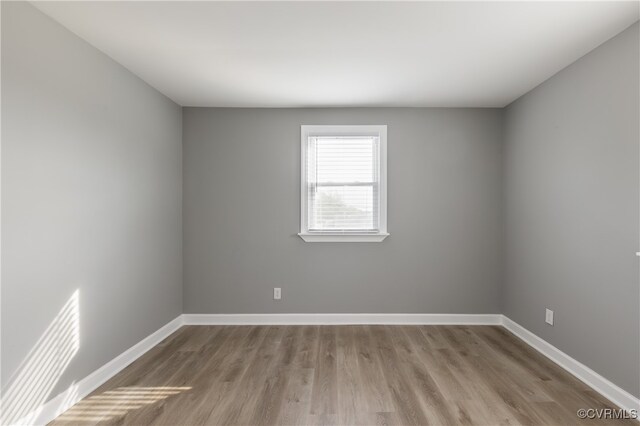 empty room with light wood-type flooring