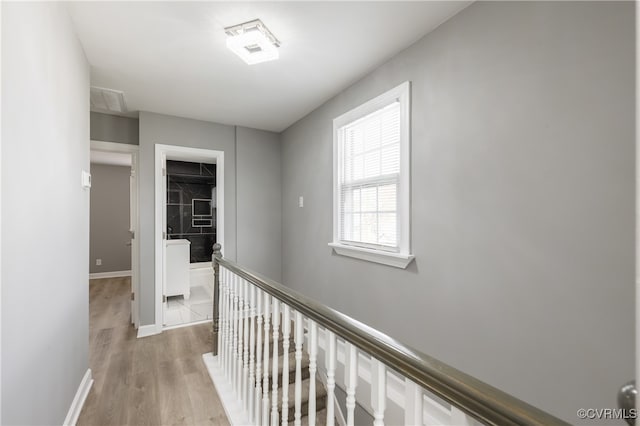 hallway featuring light wood-type flooring