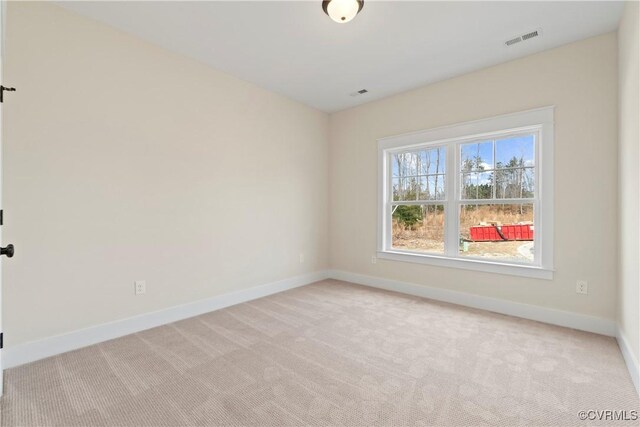 view of carpeted spare room