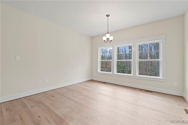 TBD3 Rocky Ford Rd, Beaverdam, VA 23015 - spare room with a chandelier, light wood-style flooring, and baseboards