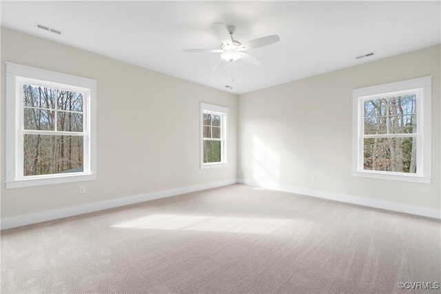 TBD3 Rocky Ford Rd, Beaverdam, VA 23015 - empty room featuring carpet, visible vents, and a wealth of natural light