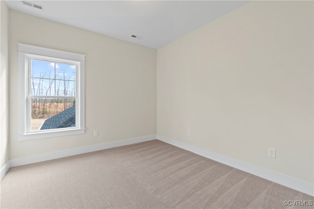 unfurnished room with carpet flooring