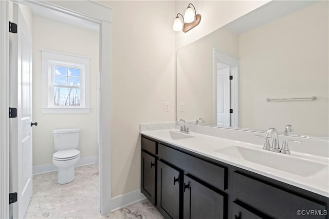 TBD3 Rocky Ford Rd, Beaverdam, VA 23015 - bathroom with toilet, baseboards, marble finish floor, and a sink