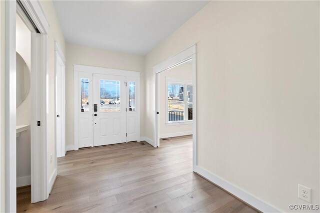 foyer entrance featuring light hardwood / wood-style flooring