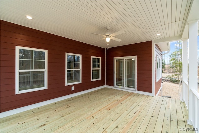 wooden deck with ceiling fan