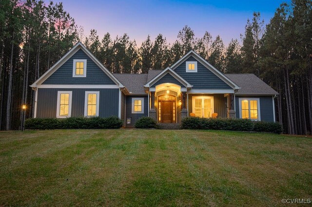 view of front of house with a lawn