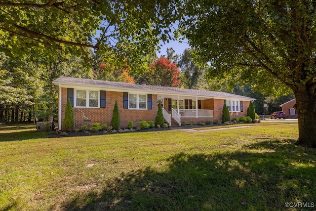 single story home with a front yard and a porch