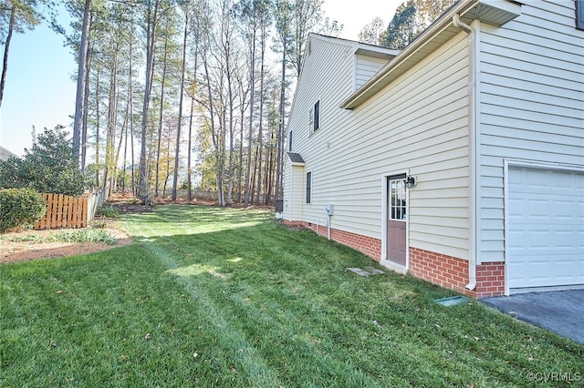 view of yard with a garage