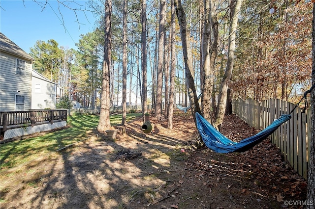 view of yard with a wooden deck