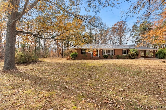 view of front of house with a carport