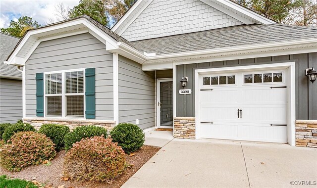 view of front of property with a garage