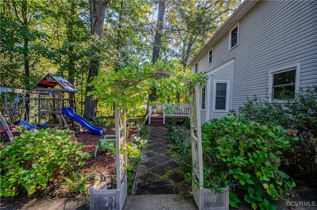 view of yard featuring a playground