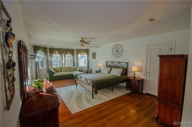 bedroom featuring hardwood / wood-style floors and ceiling fan