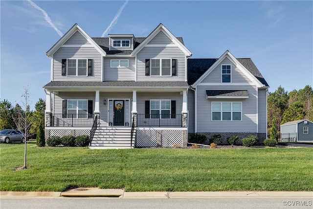 craftsman-style house with covered porch and a front yard