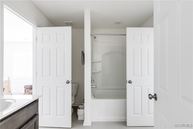 full bathroom with bathing tub / shower combination, vanity, and toilet