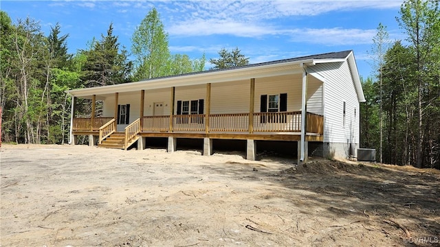 view of front of home featuring central AC and a porch