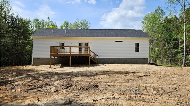 back of house featuring a deck and crawl space