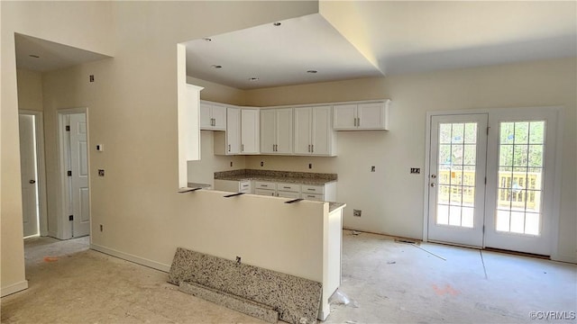kitchen featuring white cabinetry