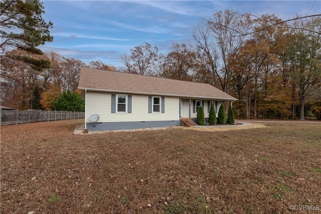 ranch-style house with a front lawn