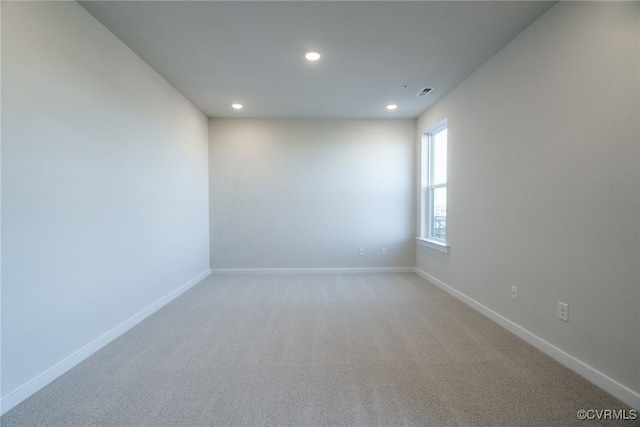 empty room with carpet flooring