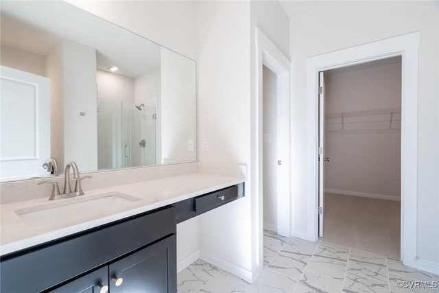 bathroom with vanity and walk in shower