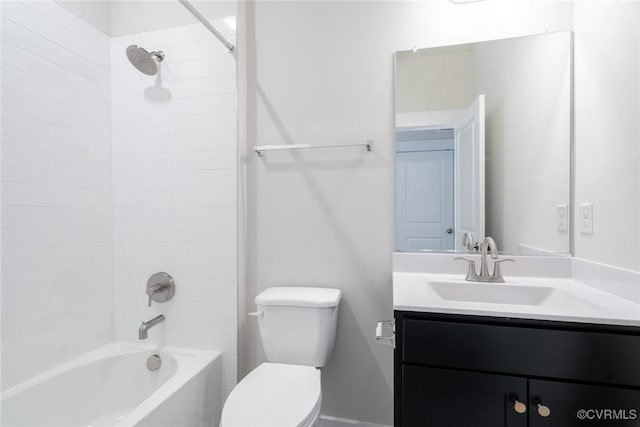 full bathroom with vanity, toilet, and tiled shower / bath