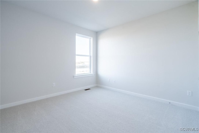 unfurnished room with carpet